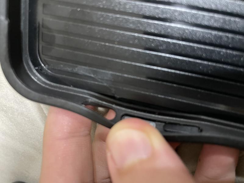 Inside portion of the case with adhesive and loose rubber