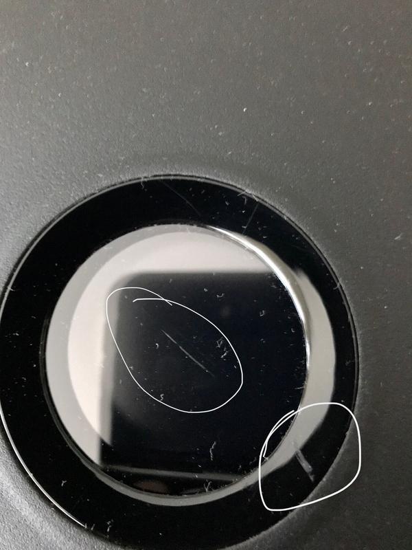 The two scratches that are circled