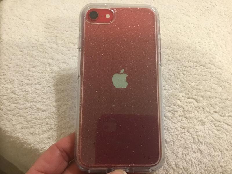 Glitter backed case with red iPhone.