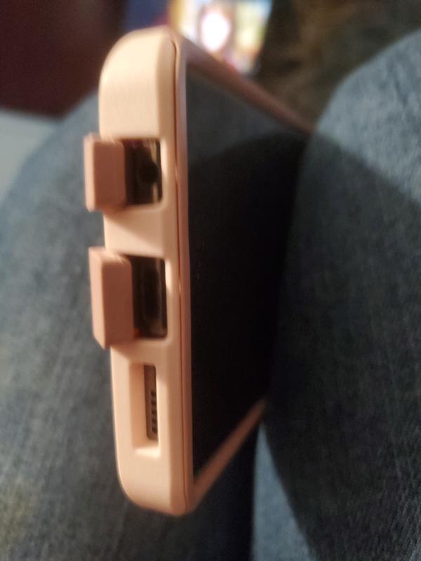 Here are a few pictures. When the protection tabs are closed they don't come open easily. You need to press them open. I feel it's awesome!