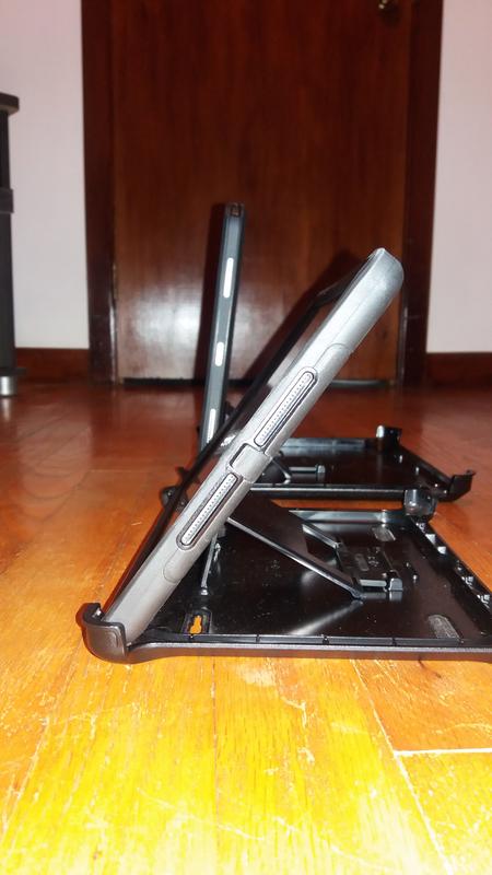 In the foreground is one of my many earlier otterbox cases in it's stand.  The background is the new 12.9in (gen 3) case.