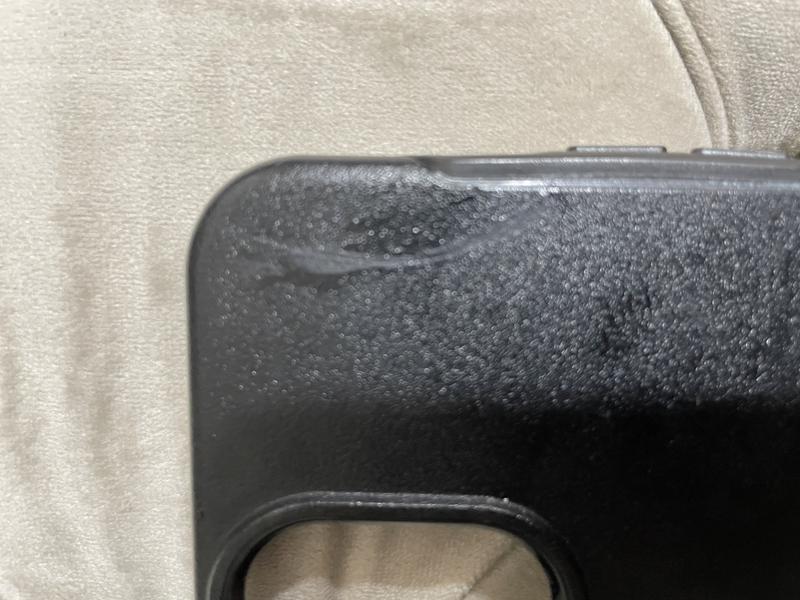 My wife’s cracked case sticked with adhesive