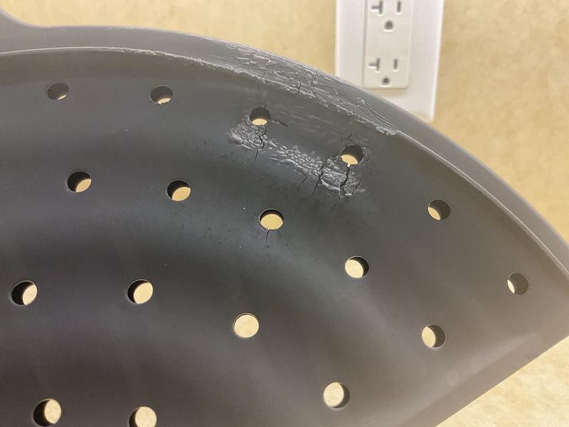 Customer photo for "Melted and too hot to flip open and closed."