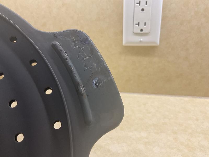 Customer photo for "Melted and too hot to flip open and closed."