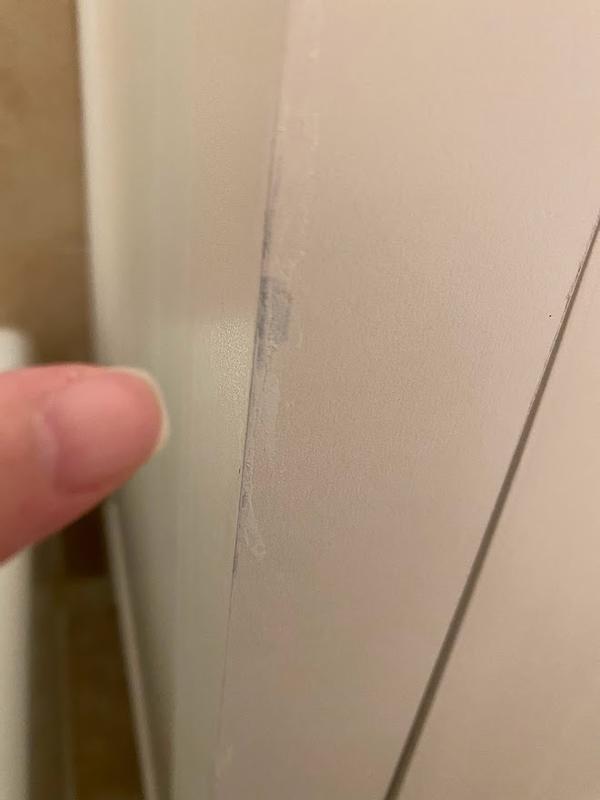 Damage on side with bad paint cover-up