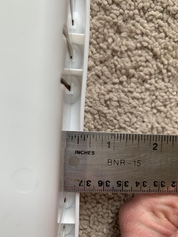 Outer edge of holder