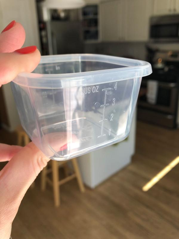 Ounces measurements on one side, mL on the other.
