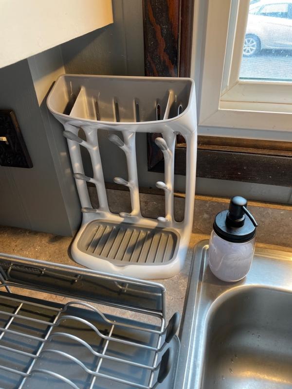 OXO Tot Space Saving Drying Rack  Free up valuable bench space with this  clever baby bottle drying rack. With a compact design that makes a big  impact, the OXO Tot Space