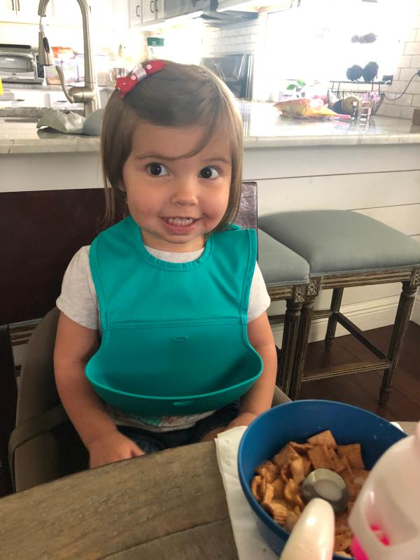My 2 year old loves to eat cereal like her older brother. I don’t mind thanks to this bib!