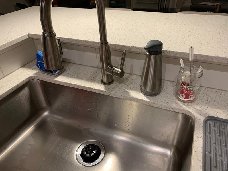 Matches my stainless sink and faucet very nicely. Love that it stays glossy!