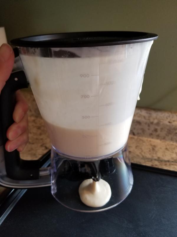 Pouring pancake batter.