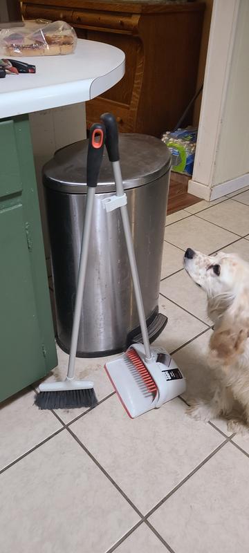 A little taller than the garbage can.