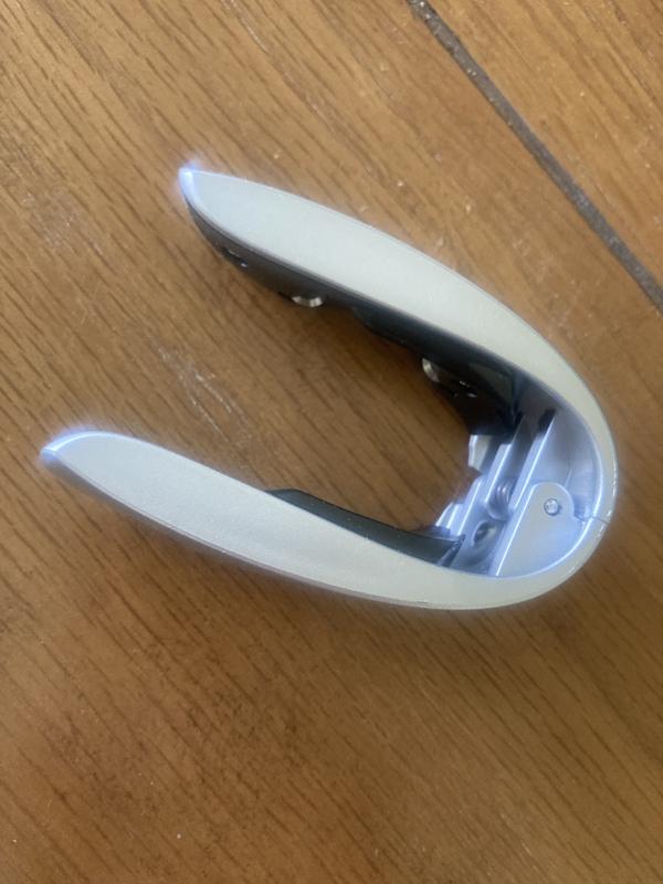 Attached foil cutter.