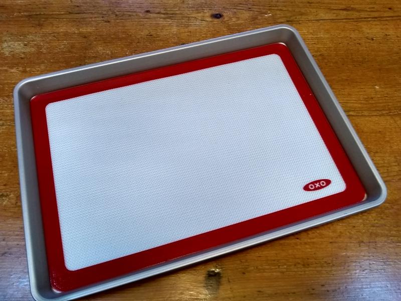 Nonstick pad fits perfectly in cooking sheet