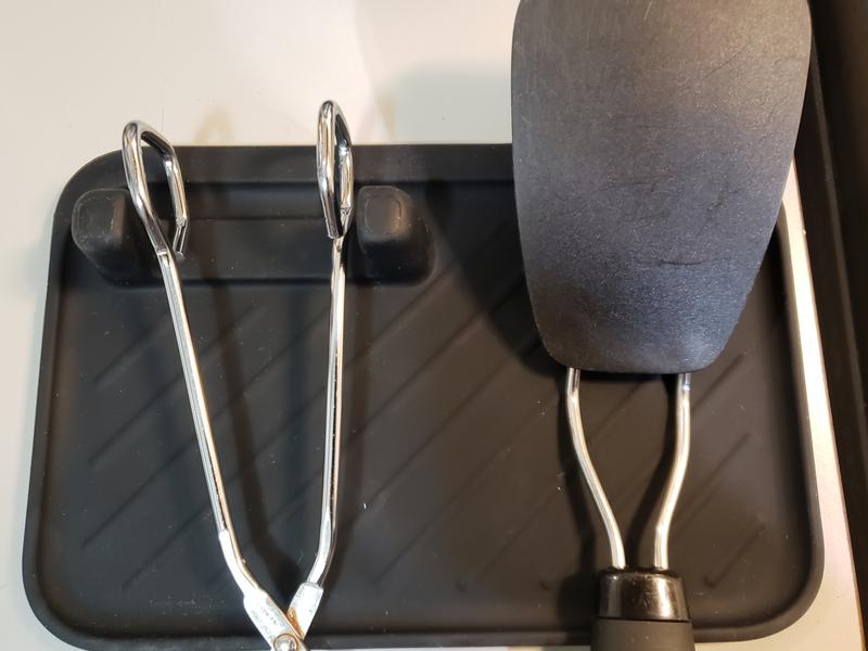 Closer look at the Tongs holder