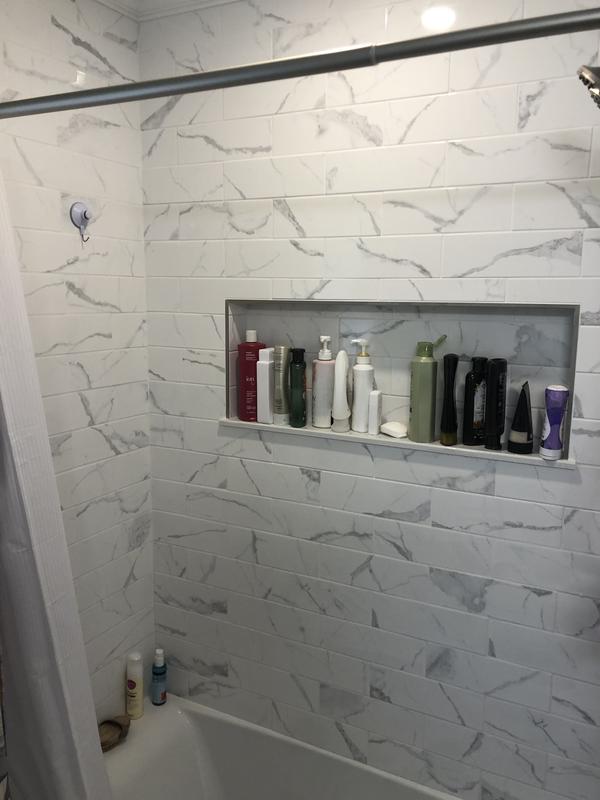 Regent Paladium Glossy 4-in x 12-in Glossy Ceramic Marble Look Wall Tile (0.32-sq. ft/ Piece)