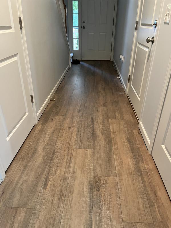 Style Selections Style Selection Urbanite Oak 8-mm T x 8-in W x 50-in L Water Resistant Wood Plank Laminate Flooring (23.92-sq ft / Carton)