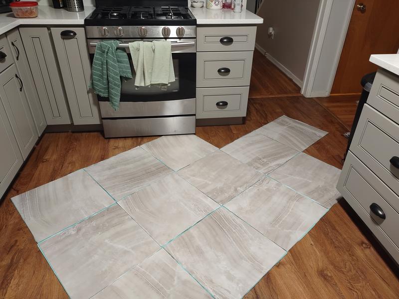 Style Selections Sorrento Marble 4-mil x 18-in W x 18-in L Groutable Water Resistant Peel and Stick Luxury Vinyl Tile Flooring