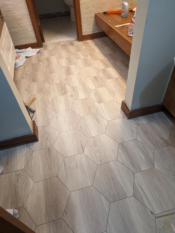 Lucida USA Java Brown Wood Look 12-mil x 6-in W x 6-in L Waterproof Peel and Stick Vinyl Tile Flooring (0.6-sq ft/ Piece)