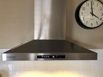 Install your range hood and wall mount vent