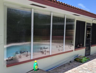 Storm-Busters 48-in x 72-in Clear Polycarbonate Hurricane Shutters in ...