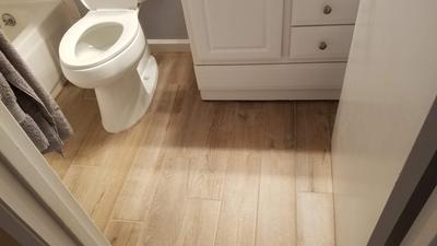 American Olean Pike Wood Brown 6-in x 36-in Glazed Porcelain Wood Look Floor and Wall Tile