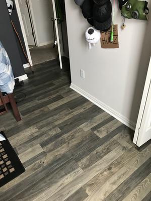 QuickStep Studio + Spill Repel Flatiron Oak 7.48-in W x 3.93-ft L Embossed Wood Plank Laminate Flooring QuickStep Studio + Spill Repel Flatiron Oak 7.48-in W x 3.93-ft L Embossed Wood Plank Laminate Flooring