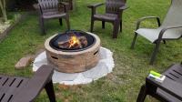 Sun Joe 35 In W Brown Stone Wood Burning Fire Pit At Lowes Com