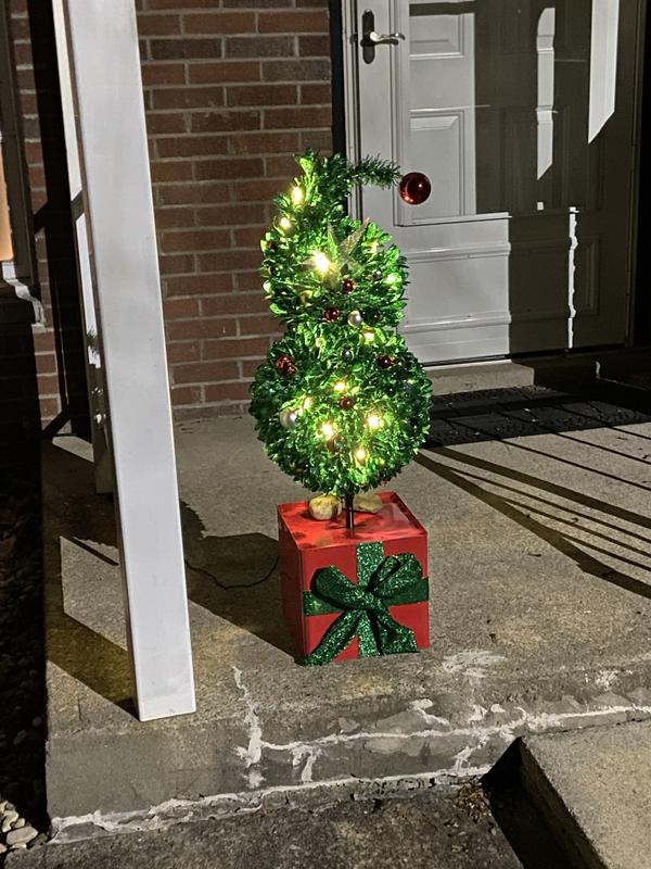 The Grinch Lighted Topiary Tree Light outlets Up LED