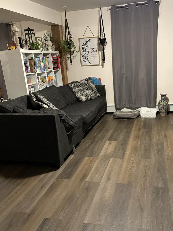 Style Selections Warm Honey Oak 12-mil x 7-in W x 48-in L Water Resistant Interlocking Luxury Vinyl Plank Flooring