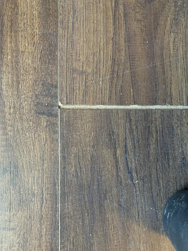 Style Selections Lawrenceville Hickory 12-mm T x 8-in W x 48-in L Wood Plank Laminate Flooring (15.94-sq ft / Carton)