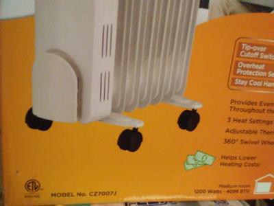 Comfort Zone Up to 1200-Watt Oil-filled Radiant Tower Indoor Electric Space  Heater with Thermostat in the Electric Space Heaters department at Lowes.com