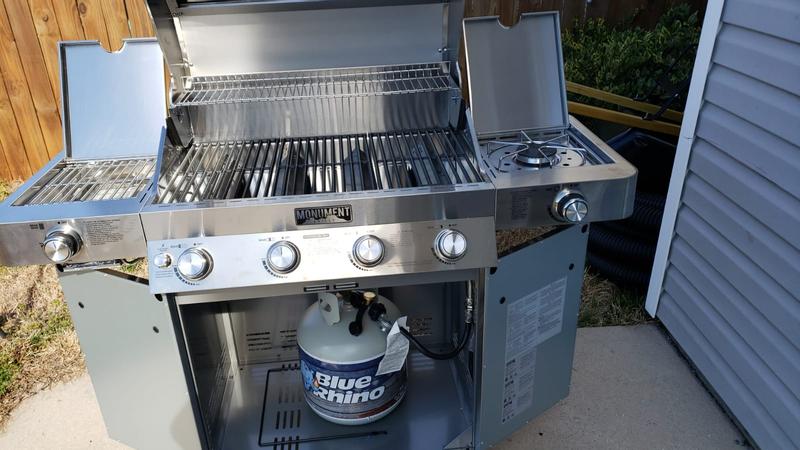 Monument Grills 4-Burner Propane Gas Grill in Stainless with Clear