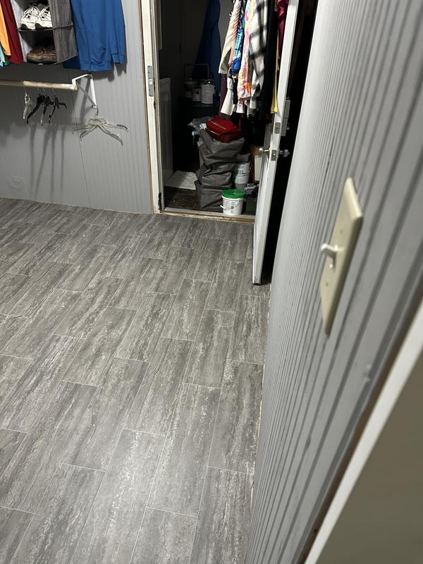 STAINMASTER (Sample) Soho Limestone Waterproof Stone Look Glue Down Sheet Vinyl STAINMASTER (Sample) Soho Limestone Waterproof Stone Look Glue Down Sheet Vinyl