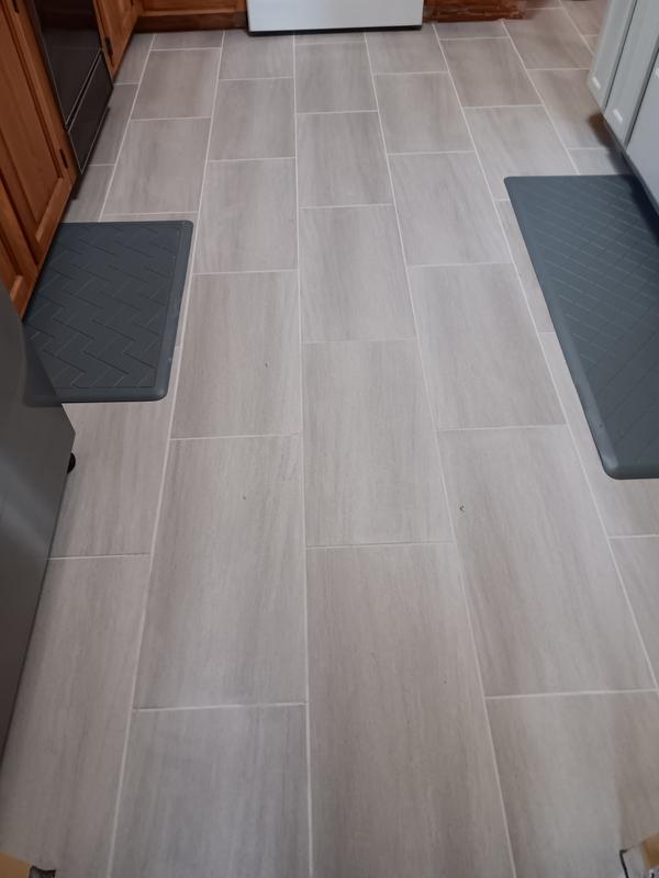 Style Selections Santori Stone 4-mil x 12-in W x 24-in L Groutable Water Resistant Peel and Stick Luxury Vinyl Tile Flooring
