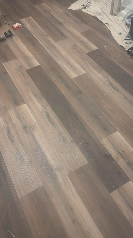 Style Selections Hickory Medley 12-mm T x 6-in W x 50-in L Water Resistant Wood Plank Laminate Flooring (17.07-sq ft / Carton)
