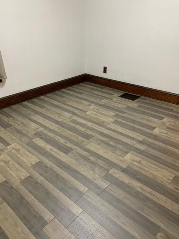 QuickStep Studio + Spill Repel Flatiron Oak 7.48-in W x 3.93-ft L Embossed Wood Plank Laminate Flooring QuickStep Studio + Spill Repel Flatiron Oak 7.48-in W x 3.93-ft L Embossed Wood Plank Laminate Flooring