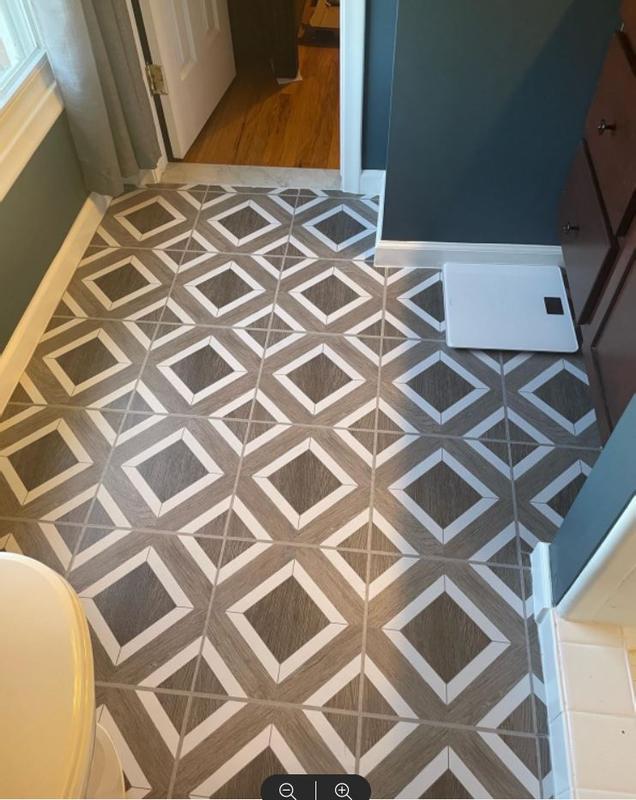 Armstrong Flooring Terraza Shadow 12-in x 12-in Water Resistant Peel and Stick Vinyl Tile Flooring (1-sq ft) Armstrong Flooring Terraza Shadow 12-in x 12-in Water Resistant Peel and Stick Vinyl Tile Flooring (1-sq ft)