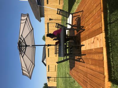 10 solar led patio umbrella Clihome 10 ft. Solar LED Market Patio Umbrella in Red with 32 Lights Weighted Base and Sandbags