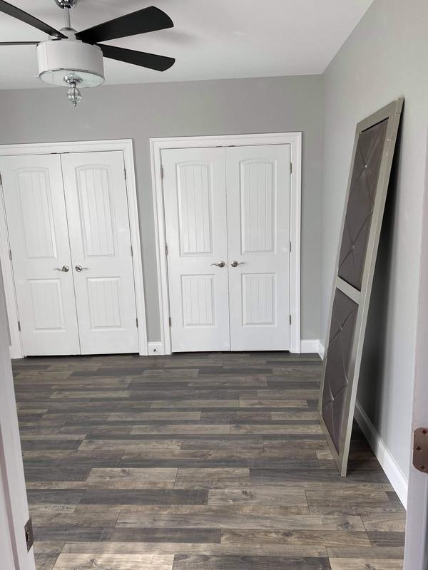 QuickStep Studio + Spill Repel Flatiron Oak 7.48-in W x 3.93-ft L Embossed Wood Plank Laminate Flooring QuickStep Studio + Spill Repel Flatiron Oak 7.48-in W x 3.93-ft L Embossed Wood Plank Laminate Flooring