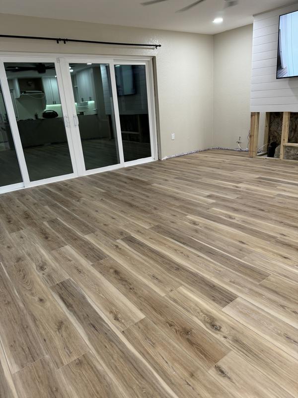 Style Selections Natural Hickory 7-in Wide x 5-1/2-mm Thick Waterproof Interlocking Luxury Vinyl Plank Flooring (18.62-sq ft) Style Selections Natural Hickory 7-in Wide x 5-1/2-mm Thick Waterproof Interlocking Luxury Vinyl Plank Flooring (18.62-sq ft)