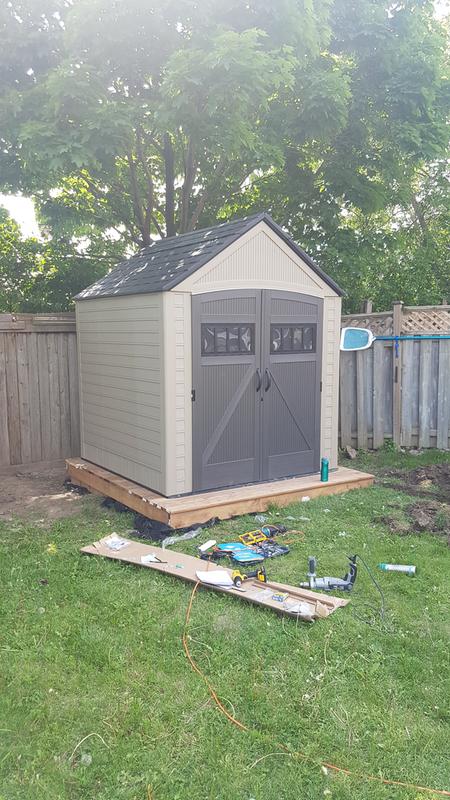 Rubbermaid 7-ft x 7-ft Roughneck Resin Storage Shed (Floor Included) in Brown | 2035893