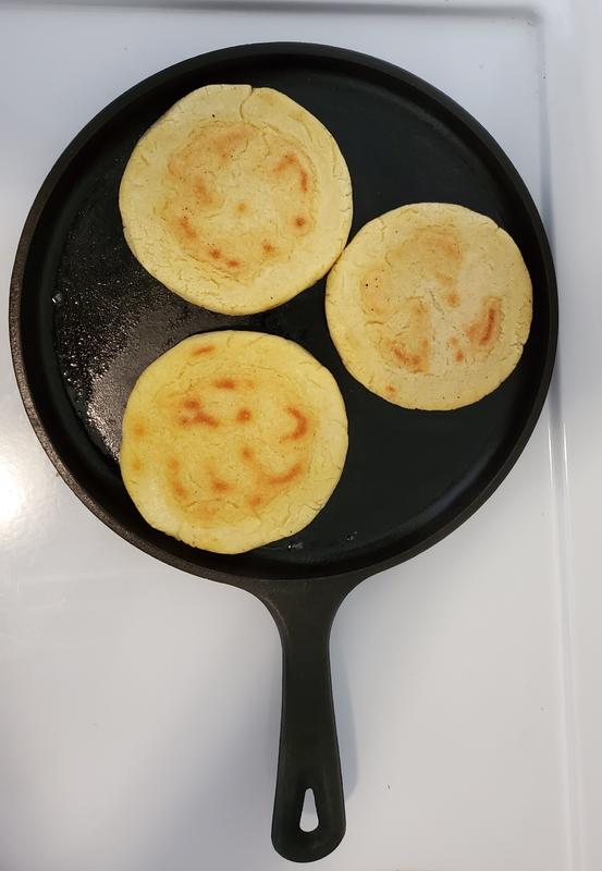 Lodge 10.5'' Round Cast Iron Griddle Pan for Pancakes, Pizzas, and