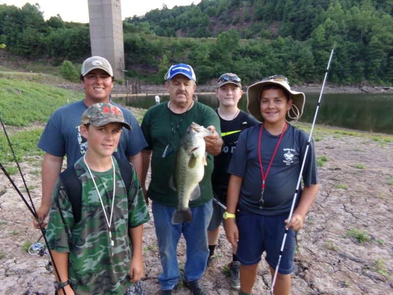 The boys don't need a boat to see what lives in this lake.