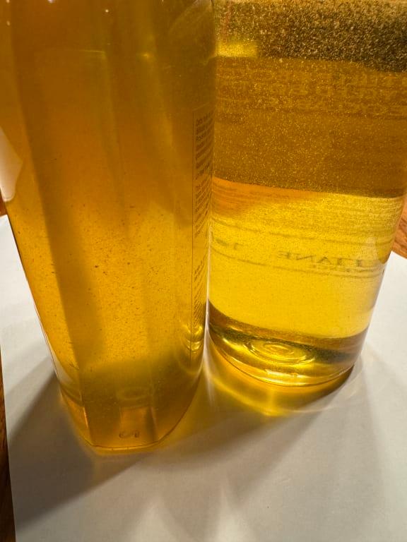 Customer photo for "Love this product but latest bottle is cloudy"