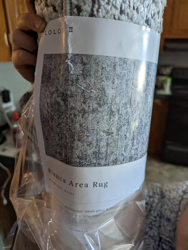 excited to open up my new area rug
