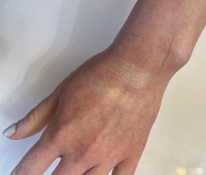 On the hand swatch, rose gold on the left