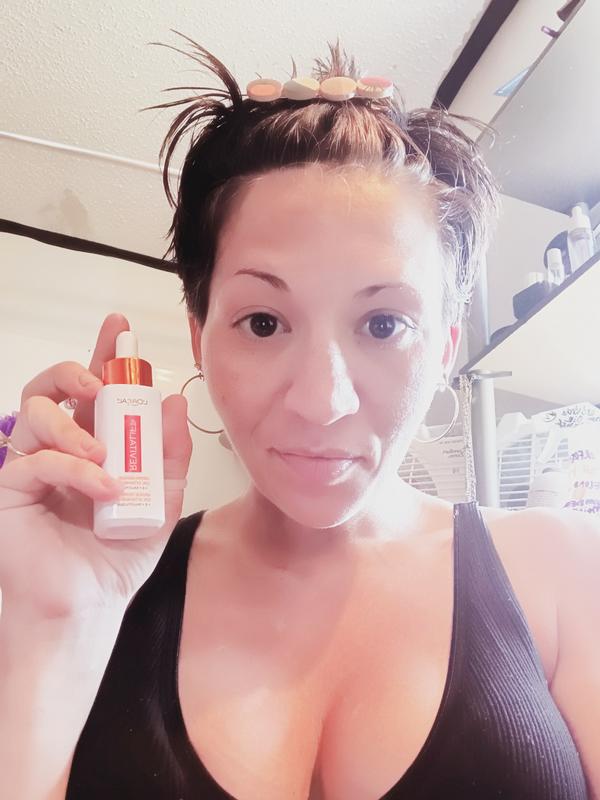 Me after cleansing and applying my VitC Serum!!