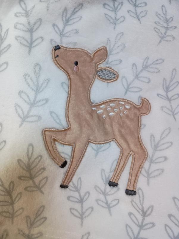 Print quality of the branch design isn't the best quality, especially compared to other Lamb & Ivy blankets that we love.