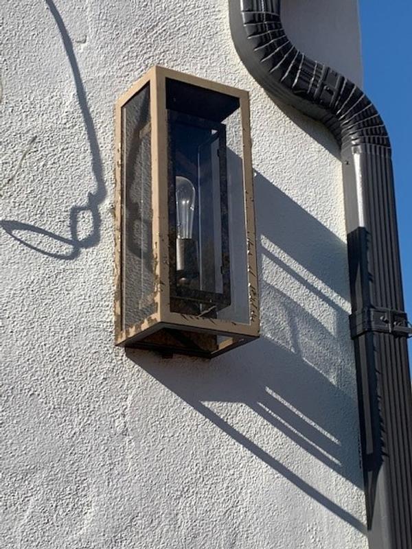 Only 2 years after installation, the finish has flaked and peeled off completely